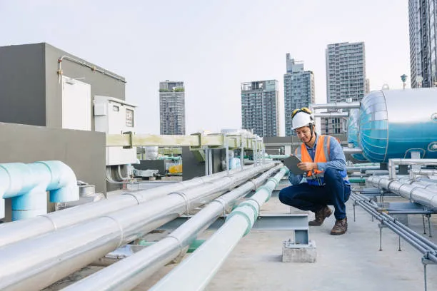 A professional roofer is inspecting for roof cleaning services Georgetown, TX