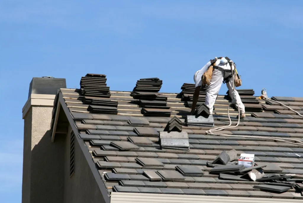 A worker is repairing roof in Cedar Park, TX.