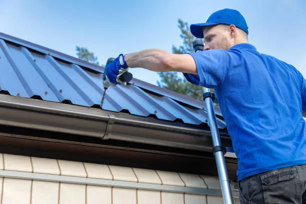 A roofer is repairing roof in Georgetown, TX