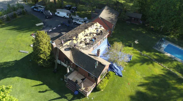 A team of professionals doing roof replacement service in Taylor, TX.