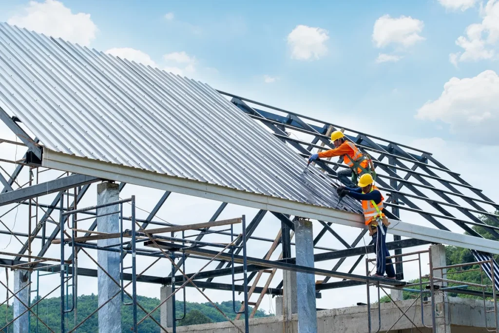 Two professionals of roofing company installing roof in Cedar Park, TX