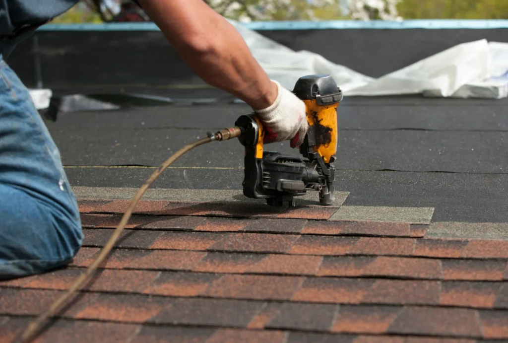 A roofer is installing shingle roof in Georgetown, TX