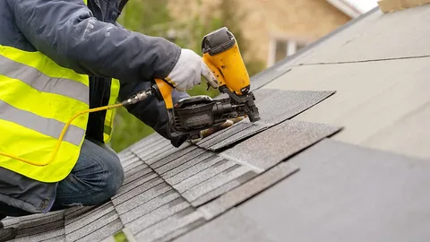 A professional roofer is installing shingles on a residential roof with precision in Austin, TX