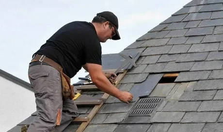 The expert roofer is delivering shingle roof installation services as part of our Round Rock, TX Roof Replacement Services on a residential home.