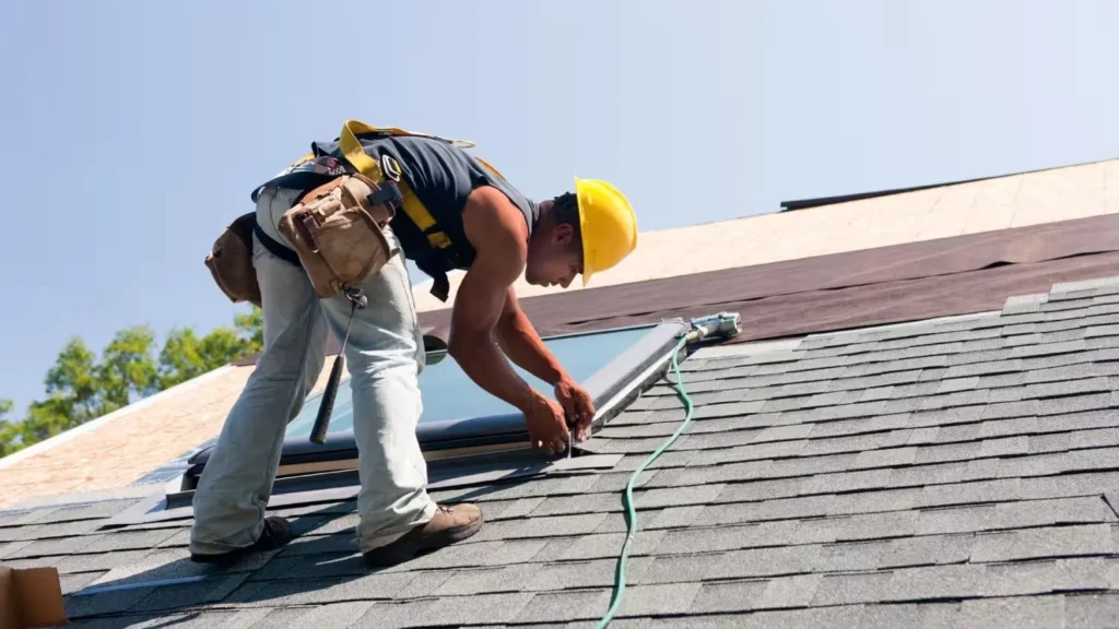 A professional roofer is repairing shingle roof in Austin, TX